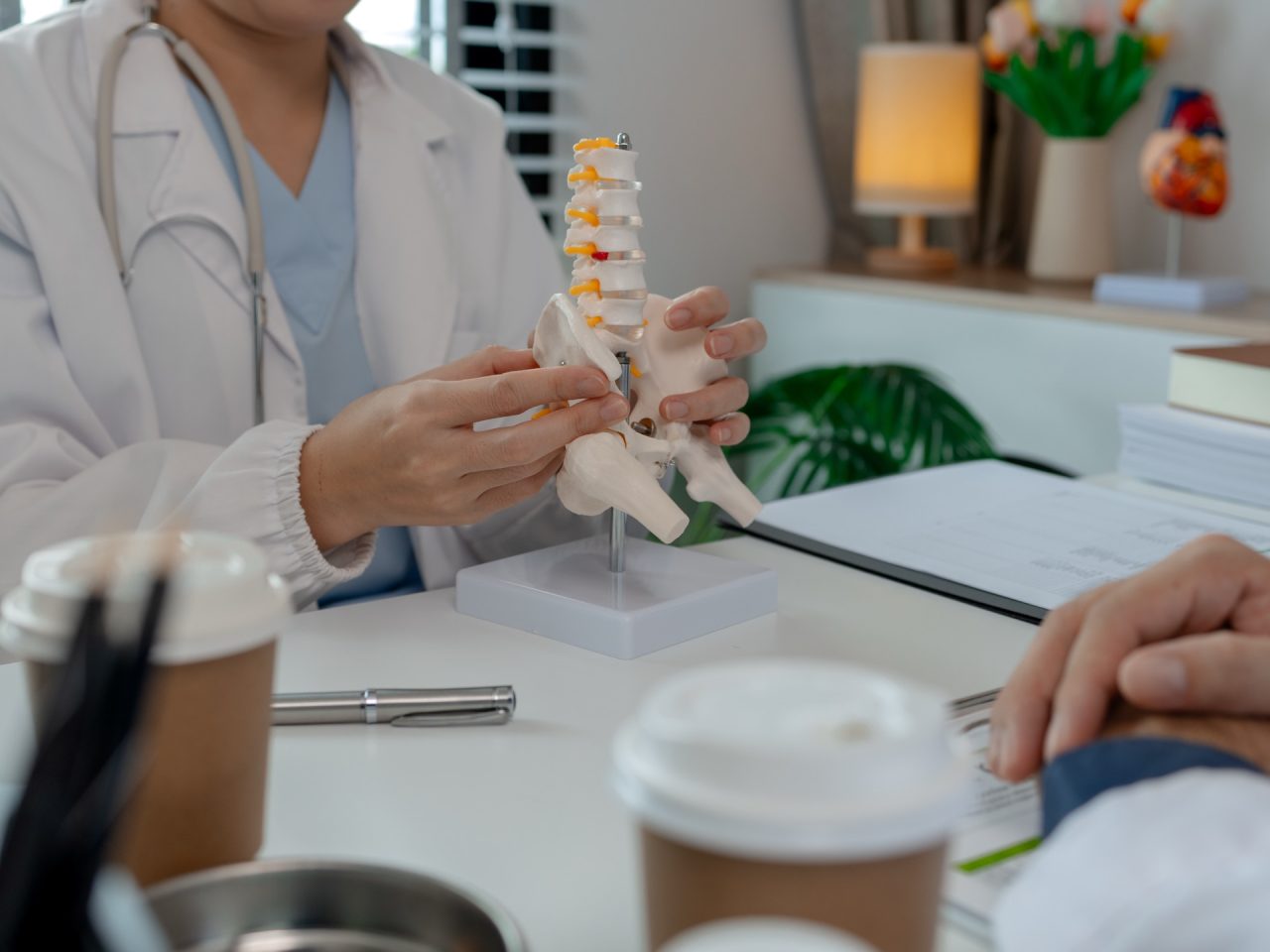 Advanced Health Solutions: two surgeons discussing an upcoming surgery in a private office